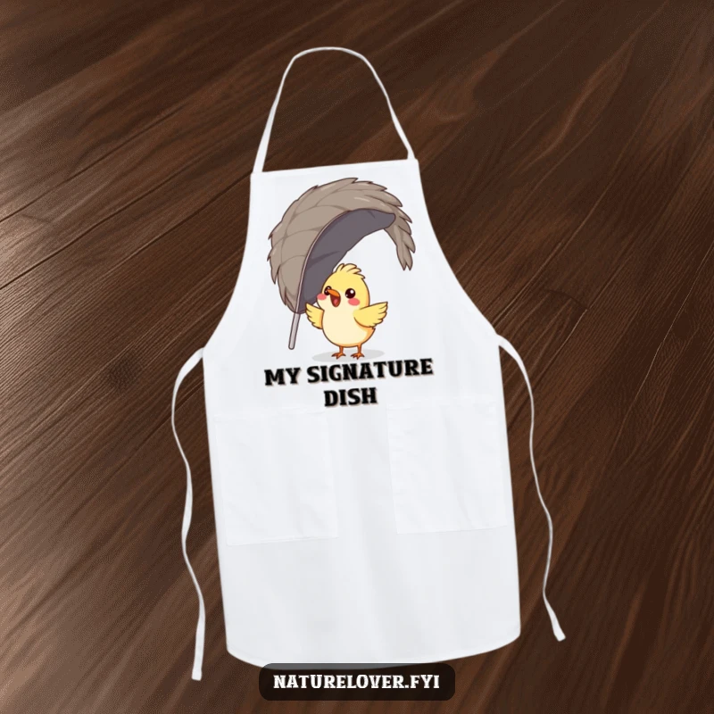 Funny bird apron showing a gleeful bird attempting to build a nest from a massive feather, perfect for kitchen humor.