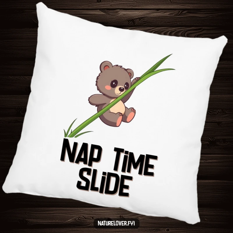 Funny bear cub pillow with a clumsy cub sliding down an enormous single blade of grass, soft and humorous.